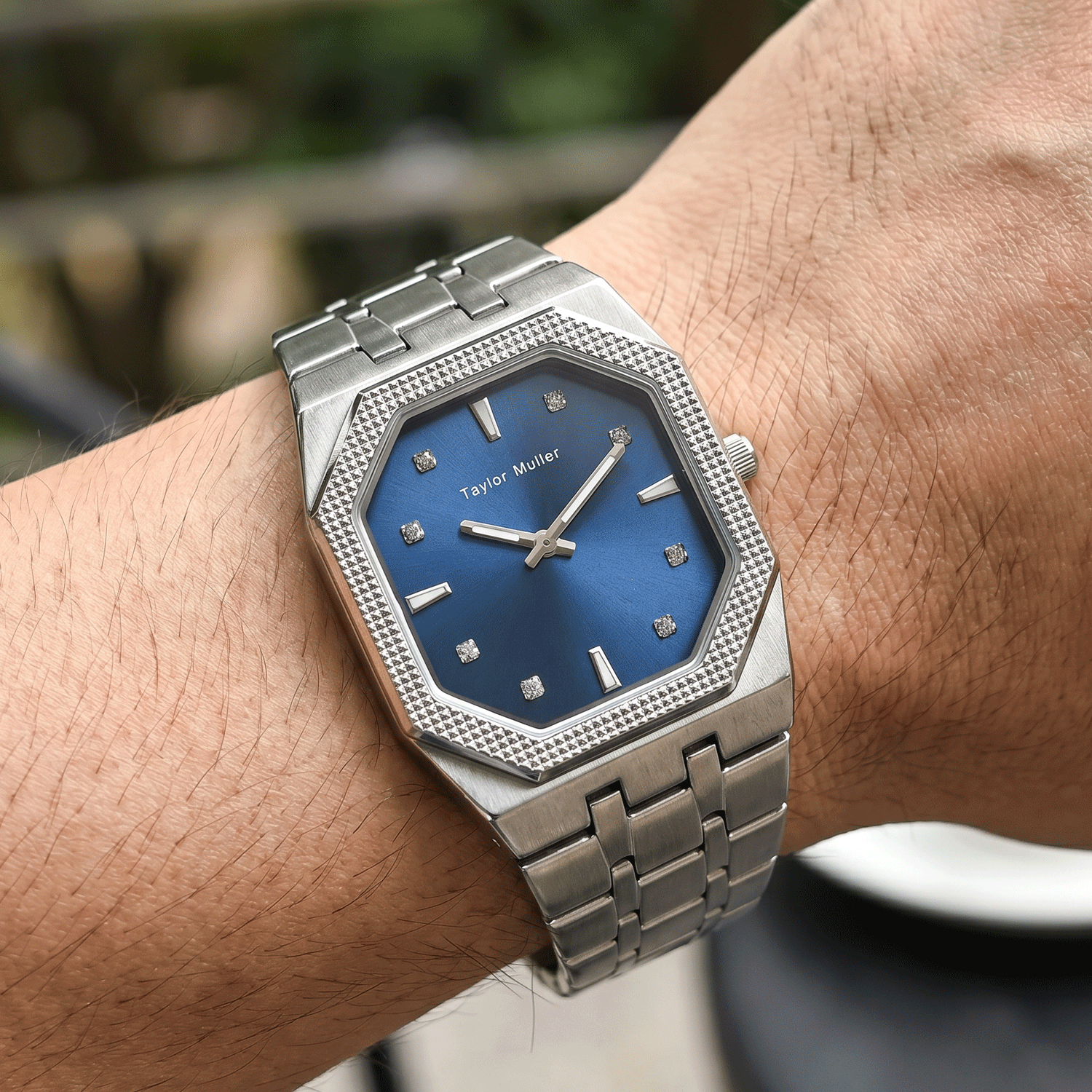 TM1019G watch — silver case, blue dial